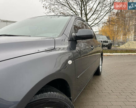 Серый Мазда 3, объемом двигателя 2 л и пробегом 188 тыс. км за 4999 $, фото 3 на Automoto.ua