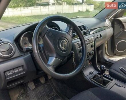 Серый Мазда 3, объемом двигателя 1.6 л и пробегом 186 тыс. км за 5000 $, фото 6 на Automoto.ua