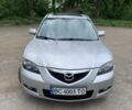 Серый Мазда 3, объемом двигателя 1.6 л и пробегом 285 тыс. км за 5700 $, фото 1 на Automoto.ua