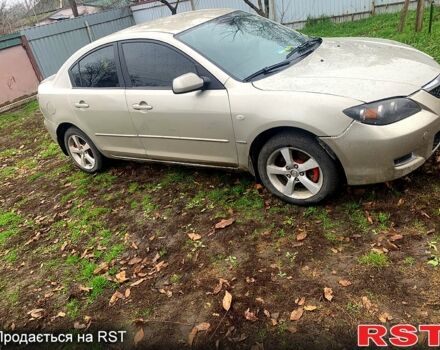 Серый Мазда 3, объемом двигателя 2 л и пробегом 307 тыс. км за 5250 $, фото 1 на Automoto.ua