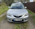 Серый Мазда 3, объемом двигателя 1.6 л и пробегом 305 тыс. км за 5500 $, фото 1 на Automoto.ua