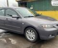 Серый Мазда 3, объемом двигателя 2 л и пробегом 129 тыс. км за 6300 $, фото 1 на Automoto.ua