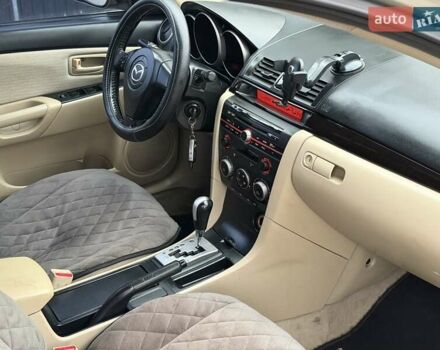 Серый Мазда 3, объемом двигателя 1.6 л и пробегом 170 тыс. км за 6000 $, фото 12 на Automoto.ua