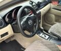 Серый Мазда 3, объемом двигателя 1.6 л и пробегом 170 тыс. км за 6000 $, фото 8 на Automoto.ua