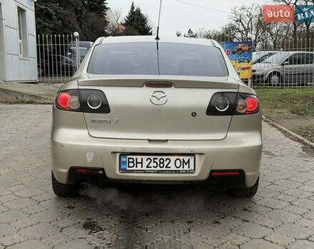 Серый Мазда 3, объемом двигателя 1.6 л и пробегом 170 тыс. км за 6000 $, фото 4 на Automoto.ua
