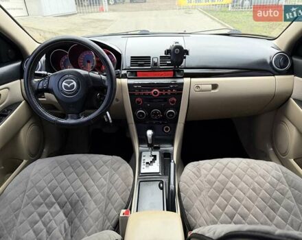 Серый Мазда 3, объемом двигателя 1.6 л и пробегом 170 тыс. км за 6000 $, фото 13 на Automoto.ua