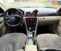 Серый Мазда 3, объемом двигателя 1.6 л и пробегом 170 тыс. км за 6000 $, фото 13 на Automoto.ua