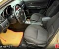Серый Мазда 3, объемом двигателя 1.6 л и пробегом 175 тыс. км за 6200 $, фото 6 на Automoto.ua