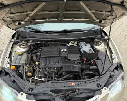 Серый Мазда 3, объемом двигателя 1.6 л и пробегом 170 тыс. км за 6000 $, фото 19 на Automoto.ua