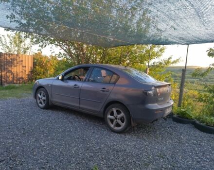 Серый Мазда 3, объемом двигателя 1.6 л и пробегом 205 тыс. км за 6000 $, фото 1 на Automoto.ua