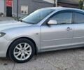 Серый Мазда 3, объемом двигателя 1.6 л и пробегом 261 тыс. км за 5699 $, фото 1 на Automoto.ua