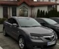Серый Мазда 3, объемом двигателя 1.6 л и пробегом 228 тыс. км за 5600 $, фото 2 на Automoto.ua