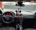 Серый Мазда 3, объемом двигателя 2 л и пробегом 157 тыс. км за 6050 $, фото 3 на Automoto.ua