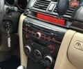 Серый Мазда 3, объемом двигателя 1.6 л и пробегом 170 тыс. км за 6000 $, фото 16 на Automoto.ua