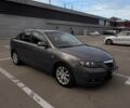 Серый Мазда 3, объемом двигателя 1.6 л и пробегом 243 тыс. км за 5700 $, фото 1 на Automoto.ua