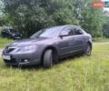 Серый Мазда 3, объемом двигателя 1.6 л и пробегом 152 тыс. км за 5600 $, фото 1 на Automoto.ua