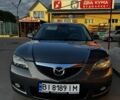 Серый Мазда 3, объемом двигателя 1.6 л и пробегом 258 тыс. км за 5300 $, фото 1 на Automoto.ua