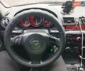 Серый Мазда 3, объемом двигателя 2 л и пробегом 157 тыс. км за 6050 $, фото 5 на Automoto.ua