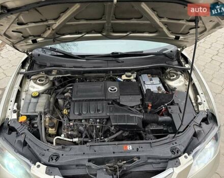 Серый Мазда 3, объемом двигателя 1.6 л и пробегом 170 тыс. км за 6000 $, фото 19 на Automoto.ua