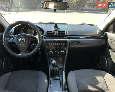 Серый Мазда 3, объемом двигателя 1.6 л и пробегом 198 тыс. км за 5500 $, фото 4 на Automoto.ua