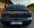Серый Мазда 3, объемом двигателя 1.6 л и пробегом 258 тыс. км за 5300 $, фото 5 на Automoto.ua