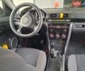 Серый Мазда 3, объемом двигателя 1.6 л и пробегом 233 тыс. км за 4200 $, фото 1 на Automoto.ua