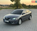 Серый Мазда 3, объемом двигателя 1.6 л и пробегом 201 тыс. км за 3950 $, фото 1 на Automoto.ua