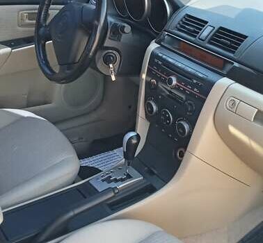 Серый Мазда 3, объемом двигателя 1.6 л и пробегом 192 тыс. км за 6700 $, фото 4 на Automoto.ua