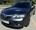 Серый Мазда 3, объемом двигателя 1.6 л и пробегом 140 тыс. км за 777 $, фото 1 на Automoto.ua
