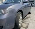 Серый Мазда 3, объемом двигателя 2 л и пробегом 129 тыс. км за 6300 $, фото 1 на Automoto.ua