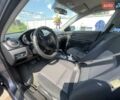 Серый Мазда 3, объемом двигателя 2 л и пробегом 129 тыс. км за 6300 $, фото 5 на Automoto.ua
