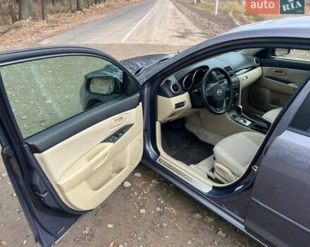 Серый Мазда 3, объемом двигателя 1.6 л и пробегом 178 тыс. км за 6250 $, фото 27 на Automoto.ua