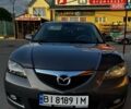 Серый Мазда 3, объемом двигателя 1.6 л и пробегом 258 тыс. км за 5300 $, фото 1 на Automoto.ua