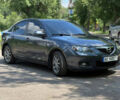Серый Мазда 3, объемом двигателя 1.6 л и пробегом 246 тыс. км за 6500 $, фото 1 на Automoto.ua
