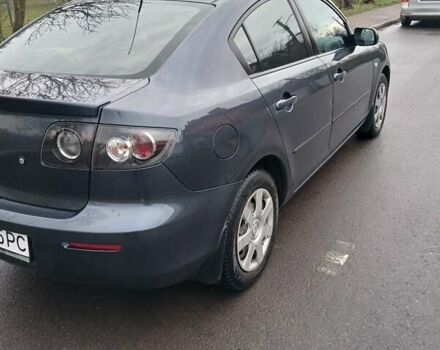 Серый Мазда 3, объемом двигателя 1.6 л и пробегом 223 тыс. км за 5600 $, фото 2 на Automoto.ua