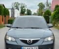 Серый Мазда 3, объемом двигателя 1.6 л и пробегом 307 тыс. км за 4750 $, фото 1 на Automoto.ua