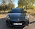 Серый Мазда 3, объемом двигателя 1.56 л и пробегом 193 тыс. км за 6700 $, фото 1 на Automoto.ua