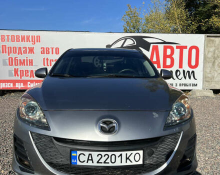 Сірий Мазда 3, об'ємом двигуна 2 л та пробігом 145 тис. км за 6200 $, фото 1 на Automoto.ua