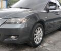 Серый Мазда 3, объемом двигателя 1 л и пробегом 307 тыс. км за 5421 $, фото 1 на Automoto.ua