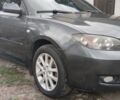 Серый Мазда 3, объемом двигателя 1 л и пробегом 307 тыс. км за 5421 $, фото 1 на Automoto.ua