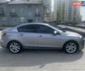 Серый Мазда 3, объемом двигателя 2 л и пробегом 206 тыс. км за 6000 $, фото 1 на Automoto.ua