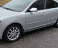 Серый Мазда 3, объемом двигателя 1.6 л и пробегом 230 тыс. км за 4954 $, фото 1 на Automoto.ua
