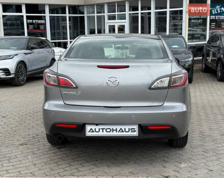 Серый Мазда 3, объемом двигателя 1.6 л и пробегом 128 тыс. км за 7999 $, фото 4 на Automoto.ua