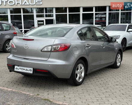 Серый Мазда 3, объемом двигателя 1.6 л и пробегом 128 тыс. км за 7999 $, фото 3 на Automoto.ua