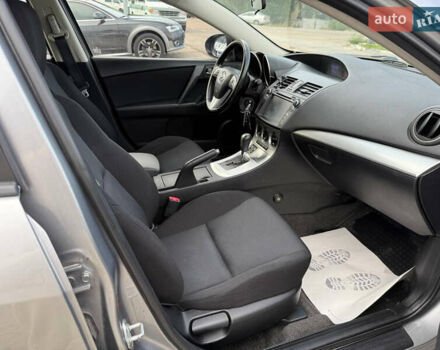 Серый Мазда 3, объемом двигателя 1.6 л и пробегом 128 тыс. км за 7999 $, фото 7 на Automoto.ua