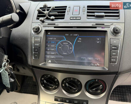 Серый Мазда 3, объемом двигателя 1.6 л и пробегом 128 тыс. км за 7999 $, фото 14 на Automoto.ua