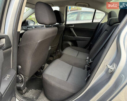 Серый Мазда 3, объемом двигателя 1.6 л и пробегом 128 тыс. км за 7999 $, фото 8 на Automoto.ua