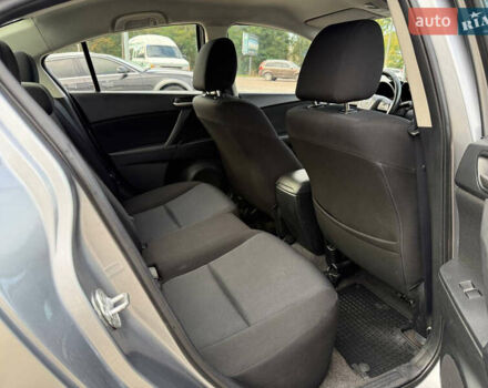 Серый Мазда 3, объемом двигателя 1.6 л и пробегом 128 тыс. км за 7999 $, фото 9 на Automoto.ua