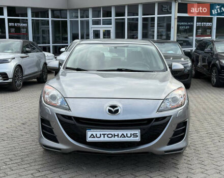 Серый Мазда 3, объемом двигателя 1.6 л и пробегом 128 тыс. км за 7999 $, фото 1 на Automoto.ua