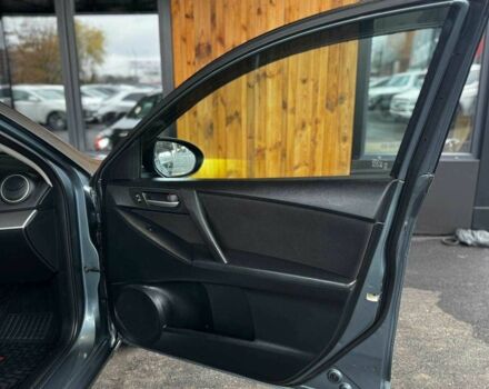 Сірий Мазда 3, об'ємом двигуна 2 л та пробігом 141 тис. км за 7599 $, фото 12 на Automoto.ua